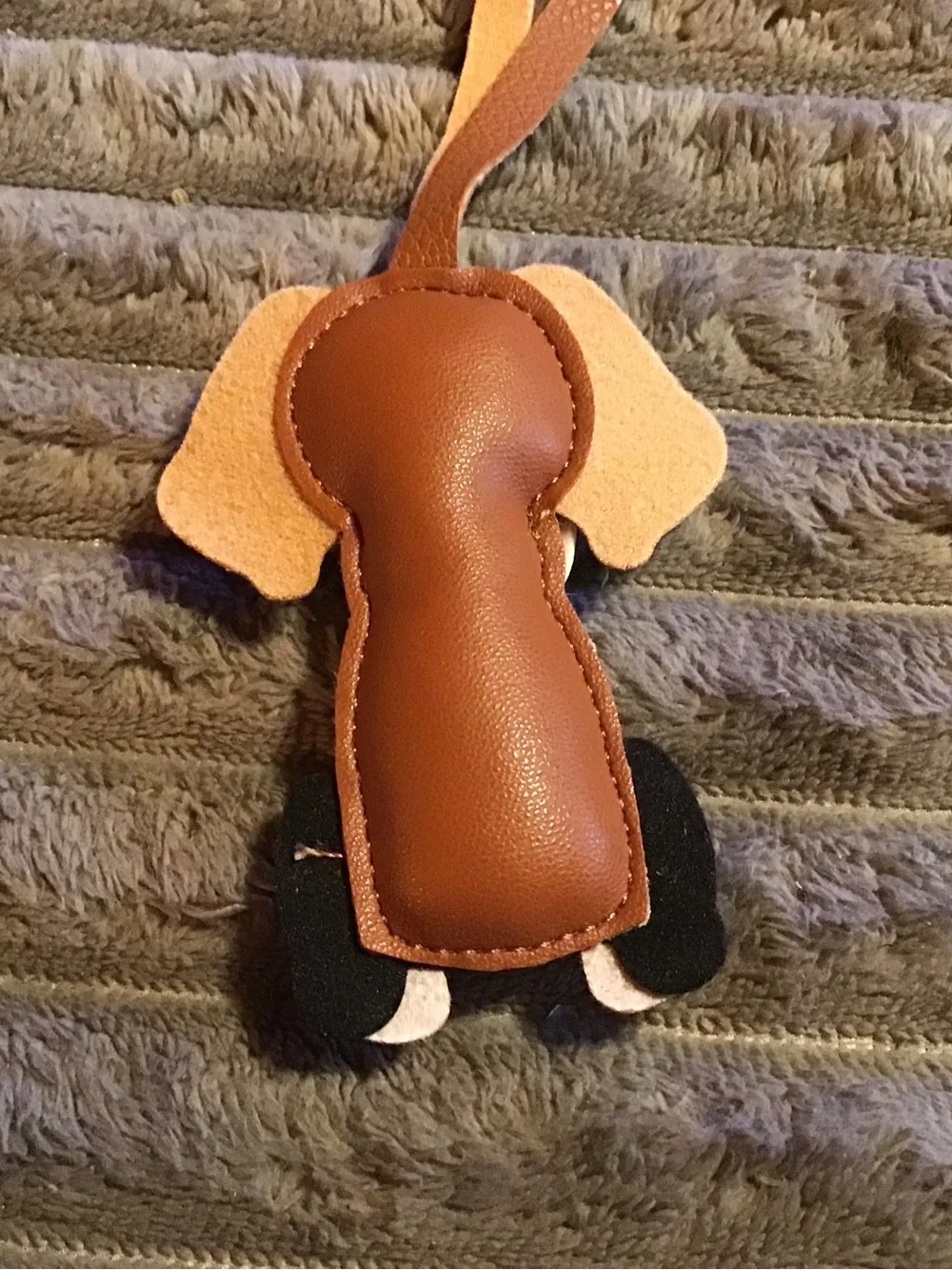 Brown and White Dog-Shaped Pet Tag or Accessory